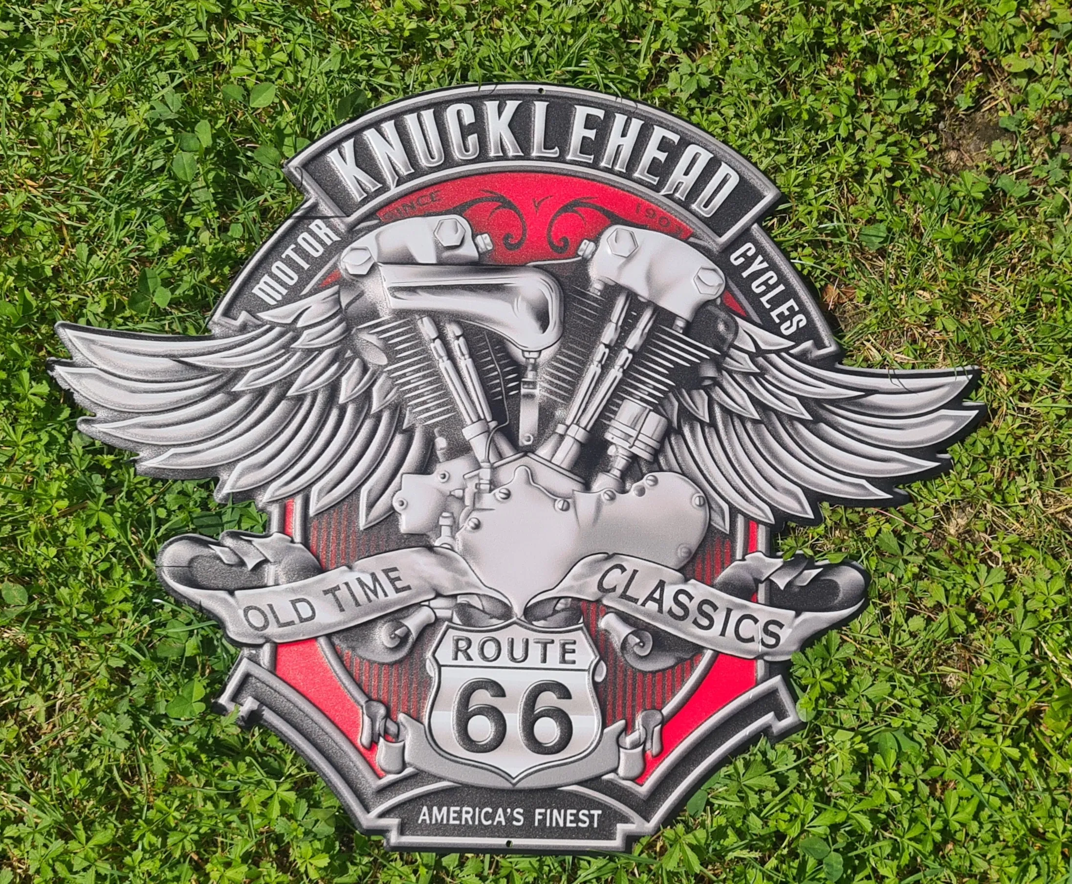 KNUCKLE HEAD METAL ART SIGNS