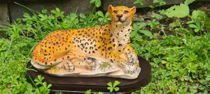 RESTING LEOPARD STATUE